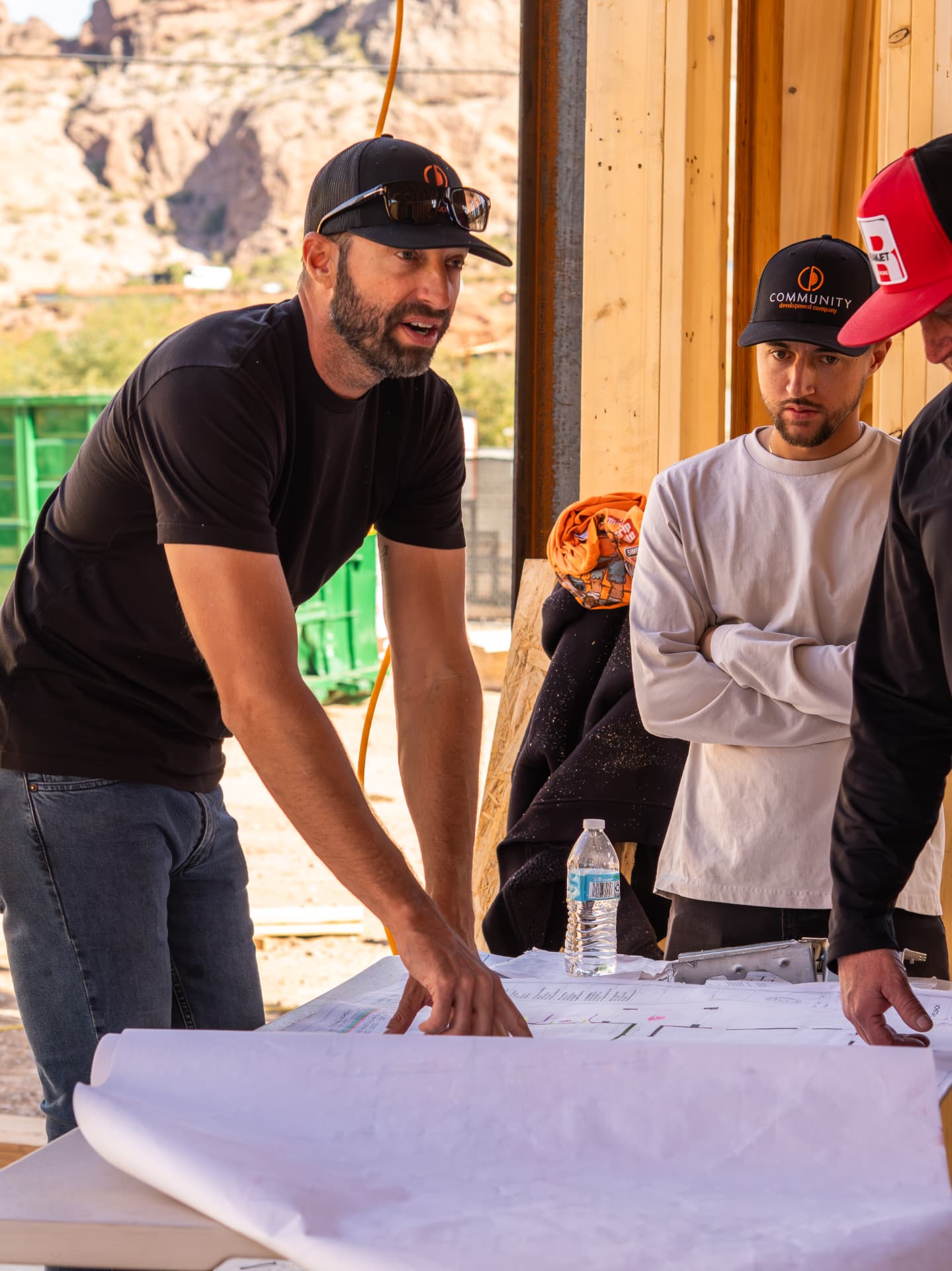 Community Development team reviewing plans on site